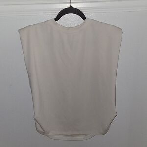 ELLE GREY Boutique Brand Women's Cream Top Size M . Padded On Shoulders.